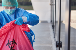 Bodily Fluid Disposal in Biohazard Waste Bag.