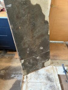 Water damage on sub flooring due to leak.